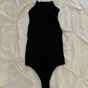 Black turtle neck bodysuit